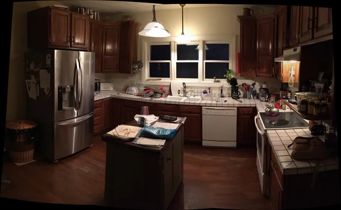 Traditional cherry kitchen with a center island and custom cabinetry
