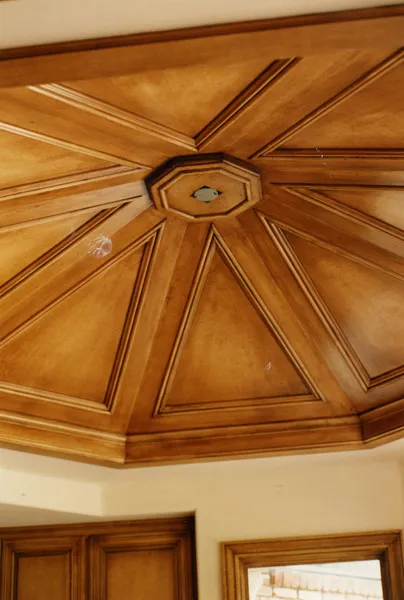 Custom coffered wood ceiling with a central dome detail
