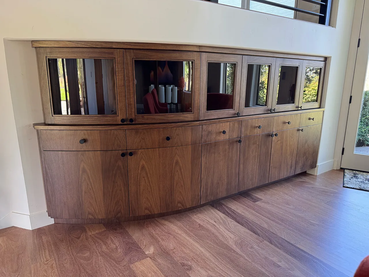 Contemporary curved walnut sideboard with glass display cabinets
